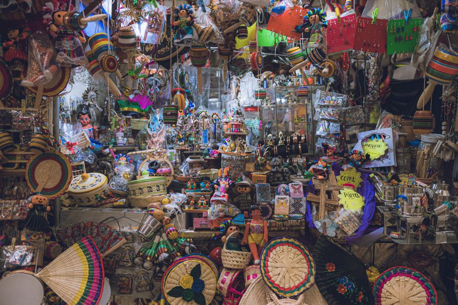 Vibrant Mexican artisan market with colorful handicrafts and textiles