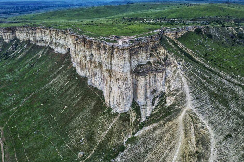 Panoramic view of Orheiul Vechi Cultural-Natural Reserve in Moldova, showcasing ancient cave monasteries and traditional villages.