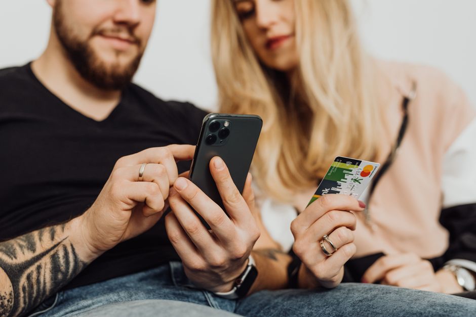 Tourist purchasing a local SIM card at Podgorica Airport, Montenegro