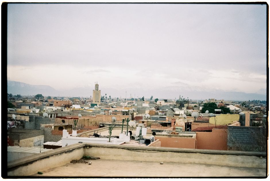 Panoramic view of diverse Moroccan landscapes, from desert dunes to mountain peaks
