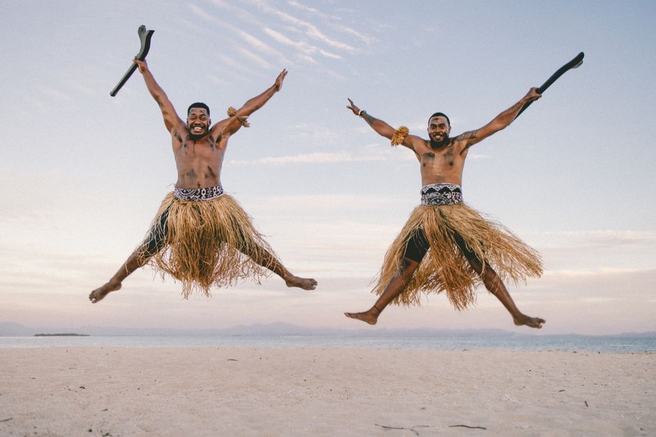 Maori performers in traditional attire during a powerful Haka in New Zealand