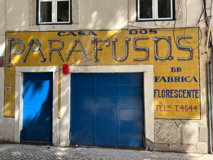 Charming hotel facade in a historic district of Portugal with traditional architecture.