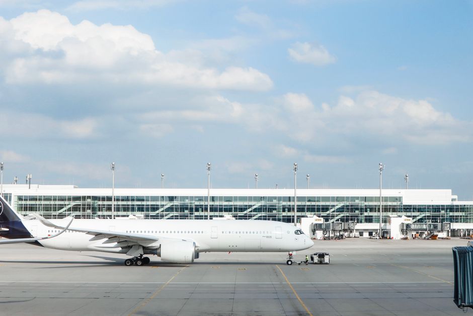 Modern airport terminal in Portugal with planes on the tarmac