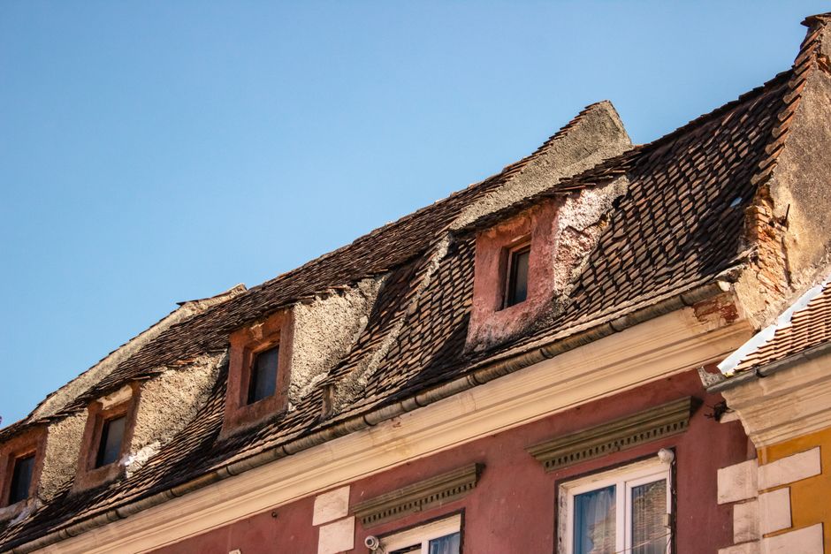 Charming old town square in Brasov, Romania with historic buildings