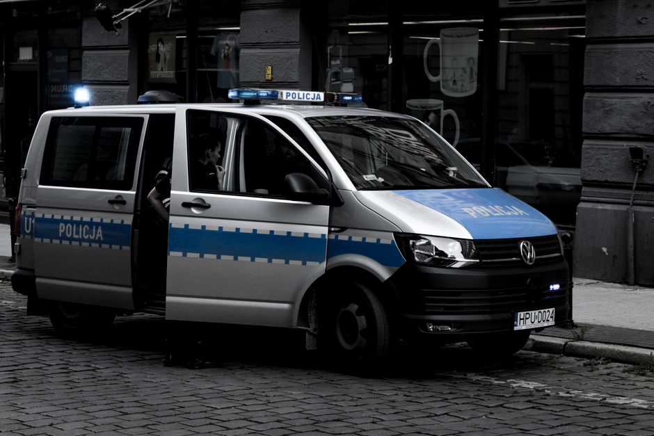 Romanian police car on a street in Bucharest, symbolizing safety and emergency services for travelers.