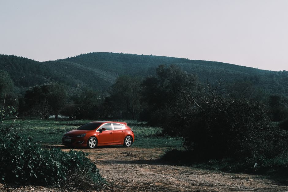 Car driving on a scenic road in rural Serbia