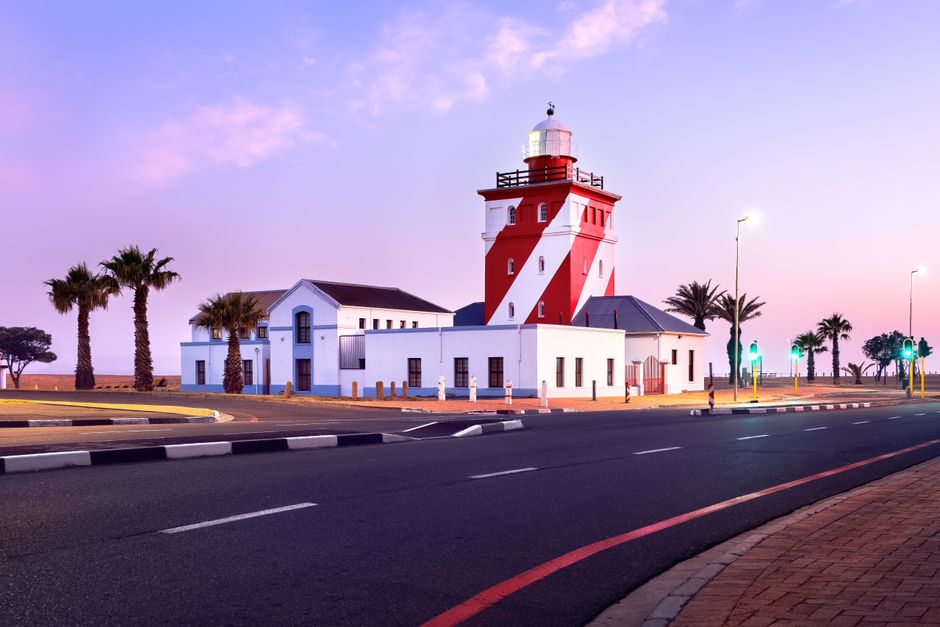 Tourist reading a safety guide in a vibrant South African city