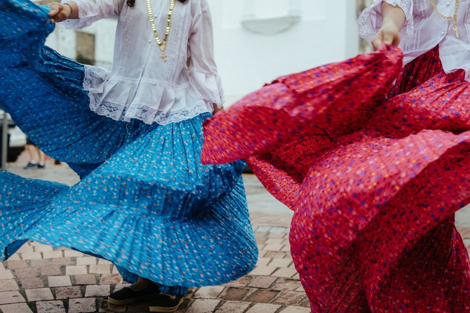 A passionate flamenco dancer performing in a traditional tablao in Seville, Spain