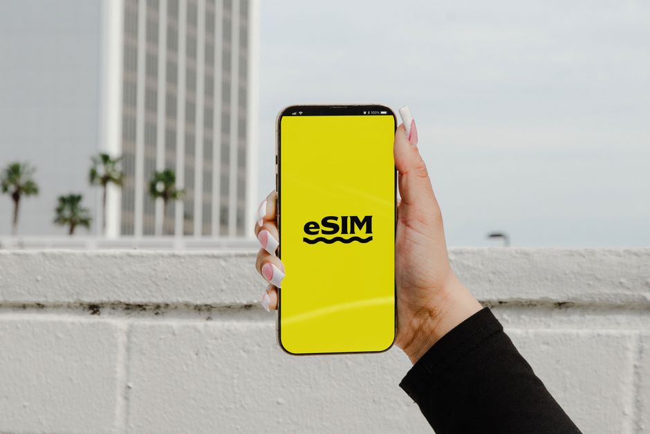 Traveler purchasing a prepaid SIM card in an official store in Spain