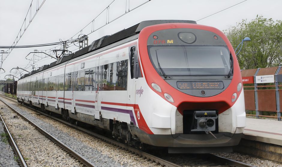 Modern AVE high-speed train arriving at a station in Spain