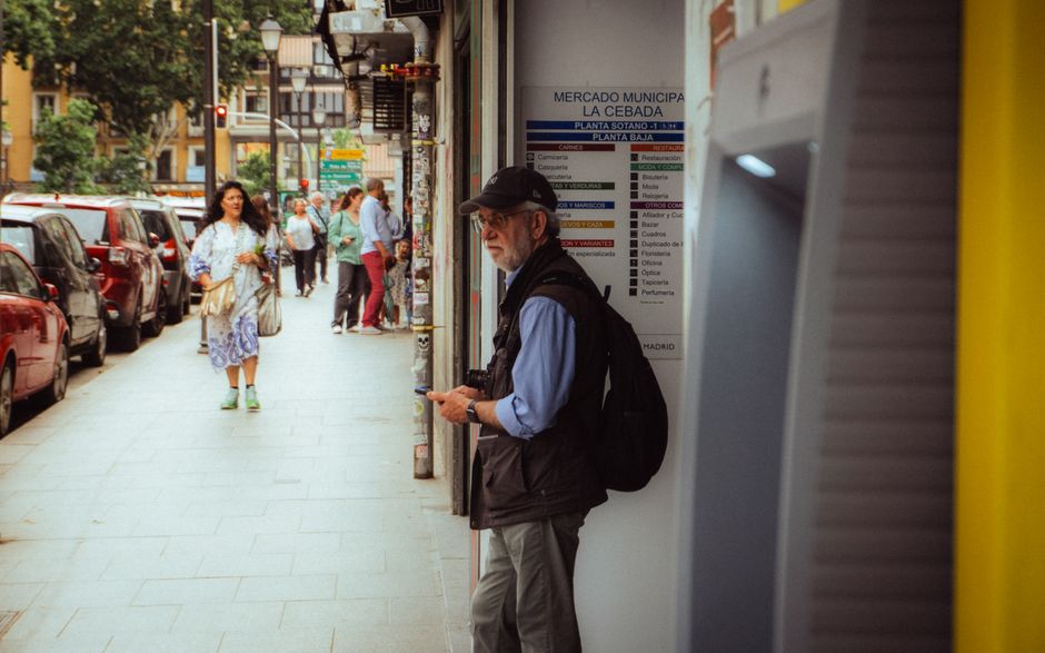 Tourist purchasing a prepaid SIM card at Madrid-Barajas Airport in Spain