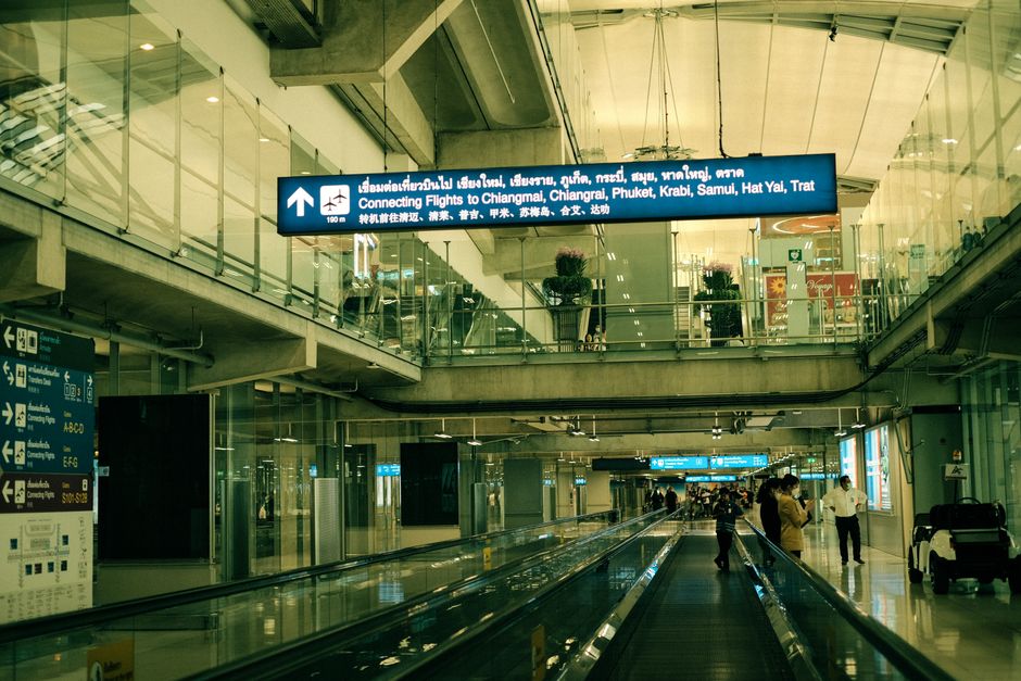 Tourist purchasing a SIM card at Suvarnabhumi Airport in Thailand