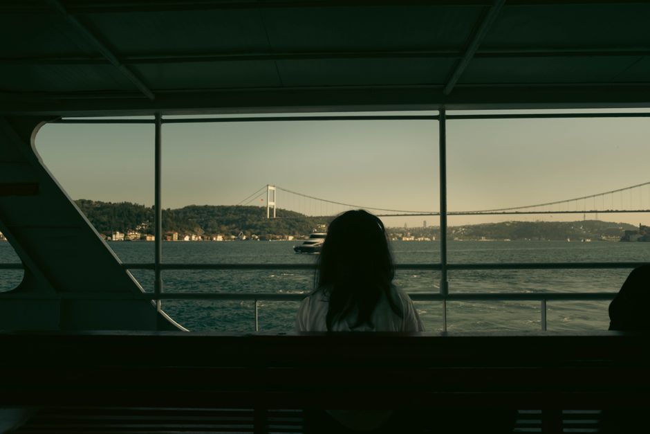 Traveler enjoying the view of the Bosphorus in Istanbul, Turkey, symbolizing peace of mind with travel insurance