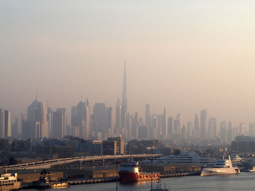 Stunning Dubai skyline at sunset with modern skyscrapers and vibrant lights in the UAE
