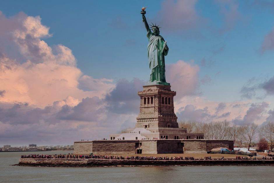 Diverse iconic attractions across the USA, including theme parks, national parks, and cityscapes.