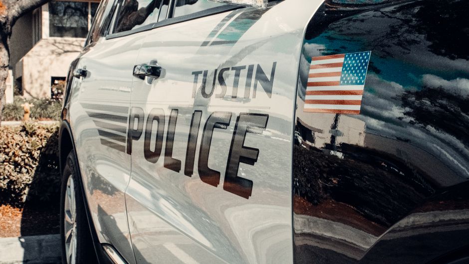 Emergency vehicle with flashing lights in a US city