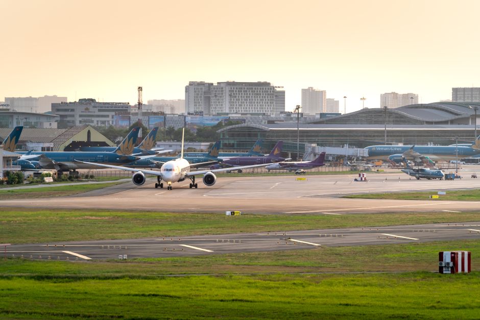 Travelers arriving at Tan Son Nhat International Airport in Ho Chi Minh City, Vietnam