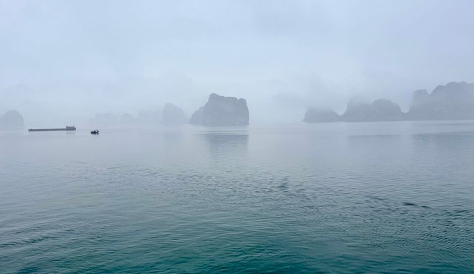 Stunning view of Ha Long Bay, Vietnam, symbolizing a worry-free travel experience with good insurance.
