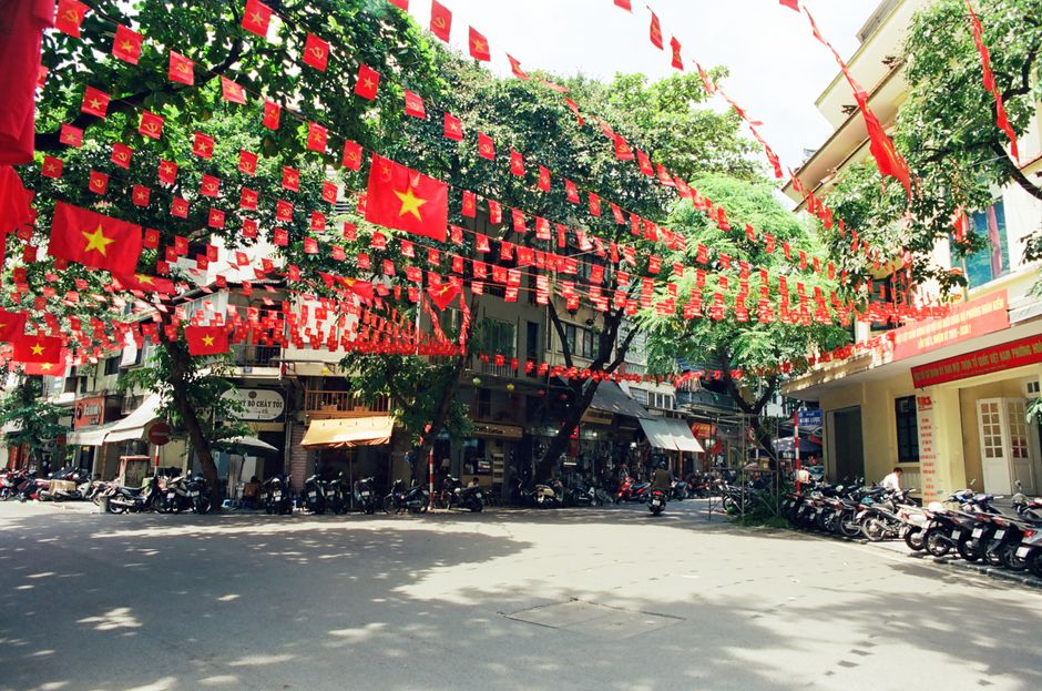 Sunny street scene in Ho Chi Minh City, Vietnam, showcasing the warm climate