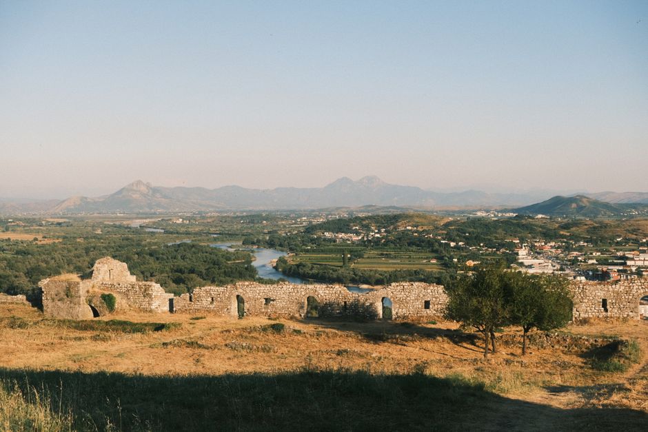 Stunning Albanian landscape with mountains and historic sites, perfect for a day trip