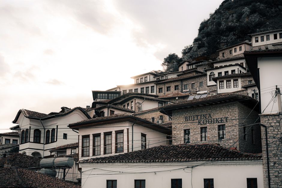 Historic Berat old town with Osum River and mountains in Albania, a popular tour destination