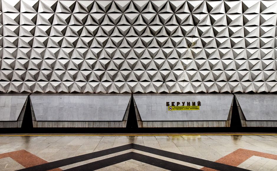 Yerevan metro station interior in Armenia with people waiting for a train