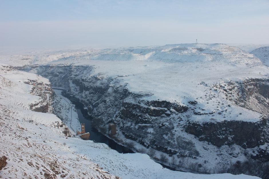 Stunning Armenian landscape showcasing diverse weather, from sunny valleys to snowy peaks
