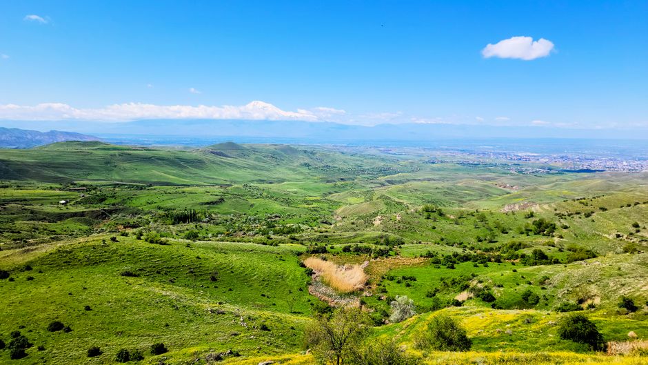 Panoramic view of a lush green valley in the mountainous regions of Azerbaijan