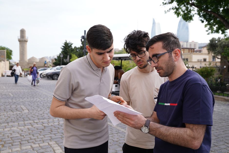 Tourist police officer in Baku's Old City, Azerbaijan, offering assistance to travelers