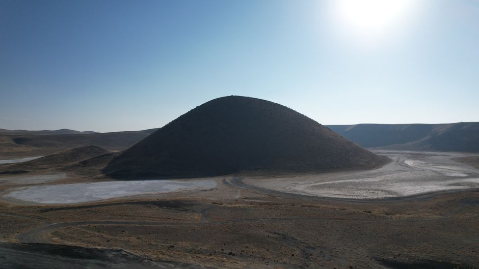 Mud volcanoes and ancient petroglyphs at Gobustan Rock Art Cultural Landscape in Azerbaijan