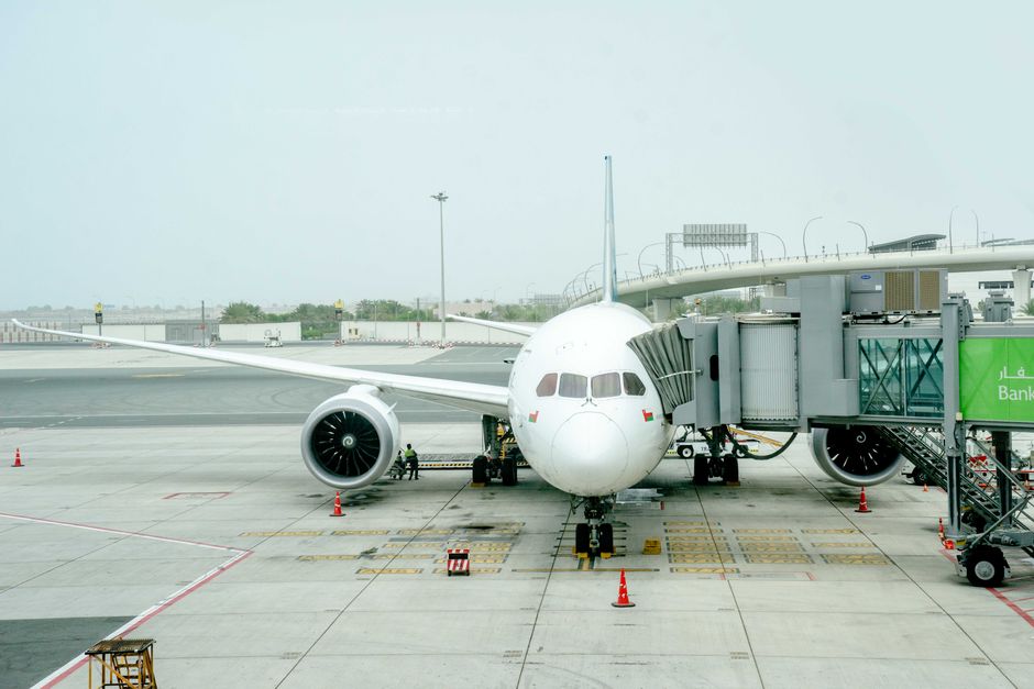 Modern terminal building of Bahrain International Airport at sunset