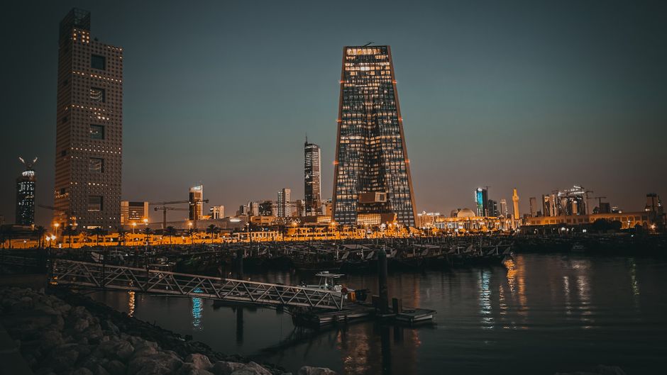 Panoramic view of Manama city skyline in Bahrain at sunset