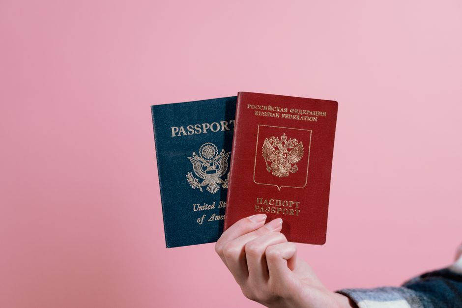 Travel insurance policy documents laid out with a map of Bahrain, symbolizing secure and planned travel.