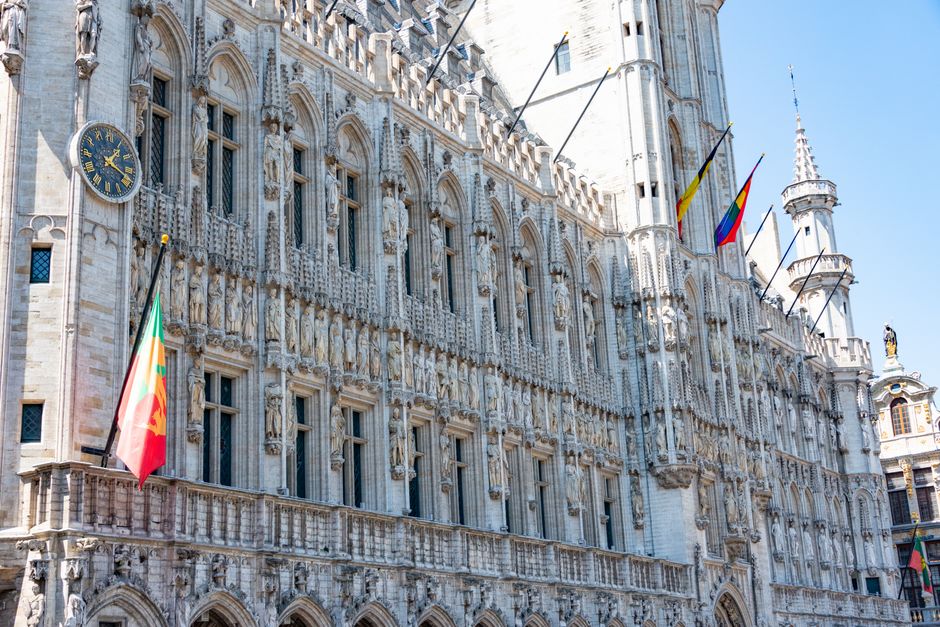 Grand Place in Brussels, Belgium, bustling with tourists and historic architecture