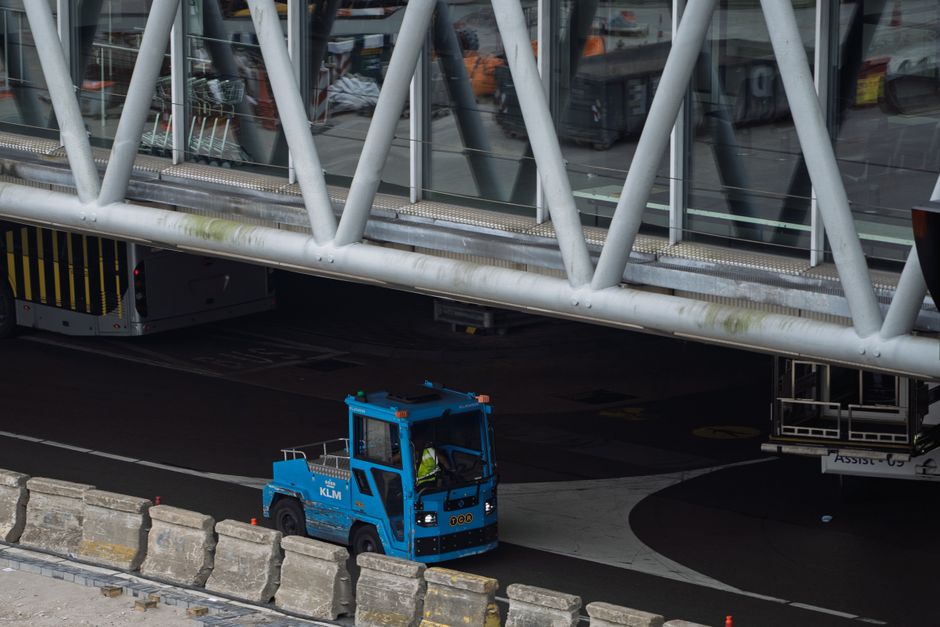 Modern interior of Brussels Airport terminal in Belgium with travelers