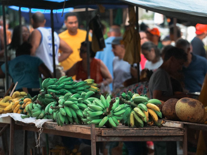 Vibrant street scene in Santo Domingo, Dominican Republic, with colorful colonial buildings and local activity