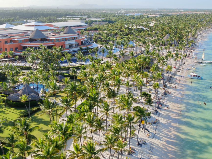 Beachfront luxury resort in Punta Cana, Dominican Republic with palm trees and turquoise water