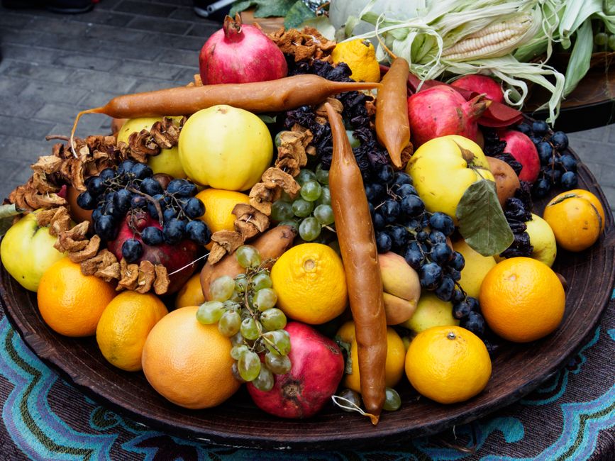 A vibrant traditional Georgian Supra feast with many dishes and wine in Georgia