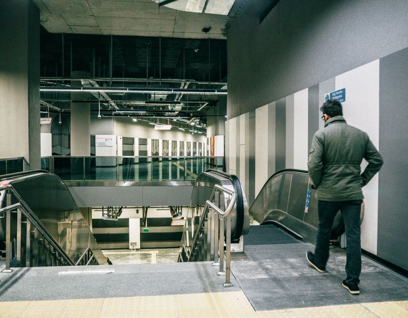 Modern Tbilisi metro station in Georgia with people waiting for a train