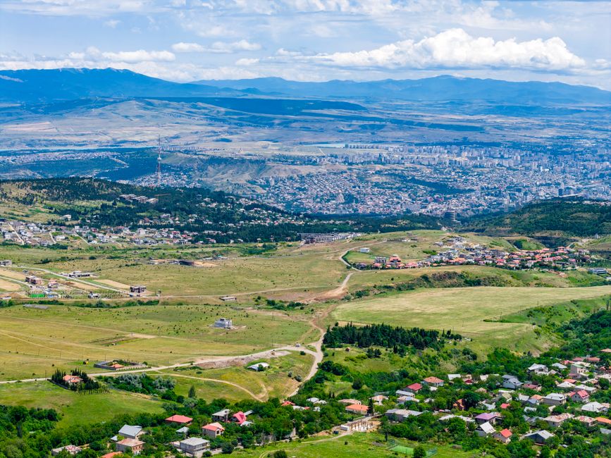 Diverse landscapes of Georgia showing different weather conditions