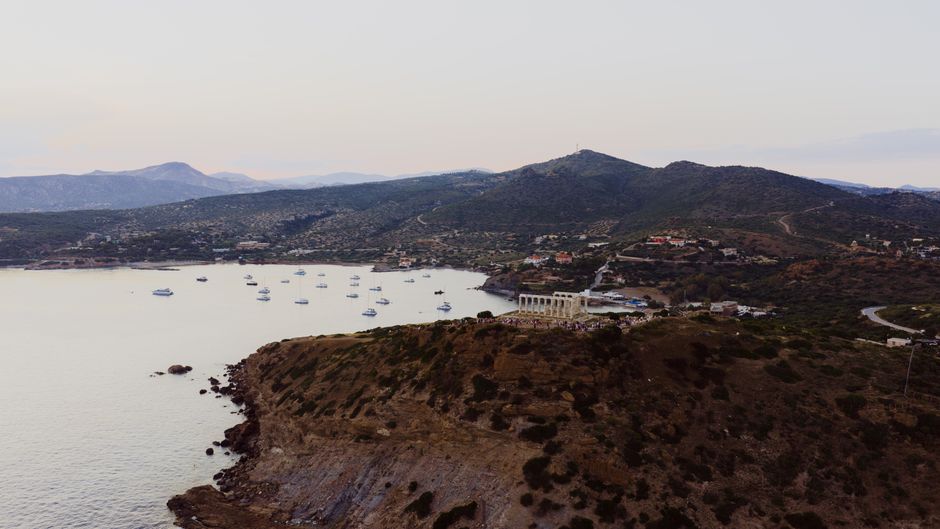 Sunset over the ancient Temple of Poseidon at Sounion, Greece