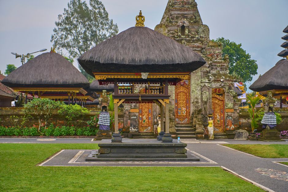 Traditional Indonesian guesthouse with lush greenery in Bali