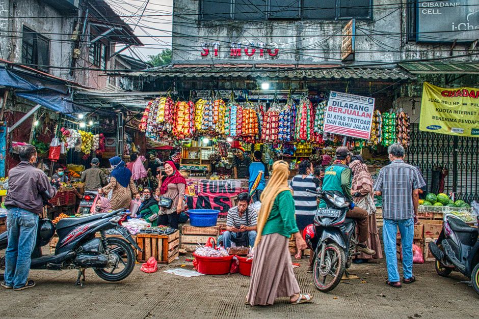 Vibrant street food market in Indonesia with various local dishes