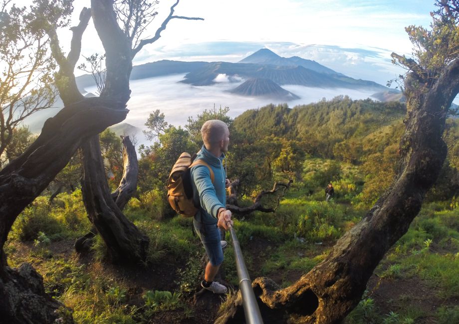 Travelers enjoying a scenic day trip in Indonesia with a stunning natural backdrop