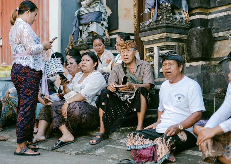 Traveler using a smartphone map app in a scenic Indonesian location