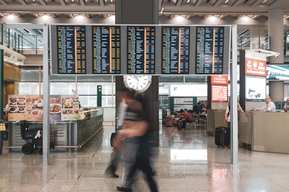 Traveler purchasing a SIM card at a mobile kiosk in Ben Gurion Airport, Israel