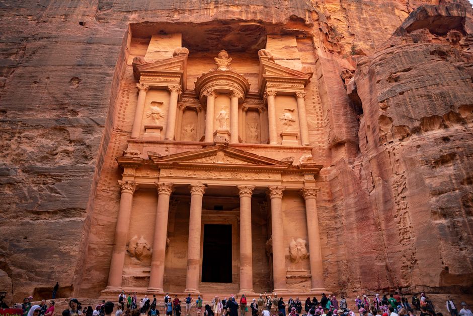 The iconic Treasury building carved into rock at Petra, Jordan