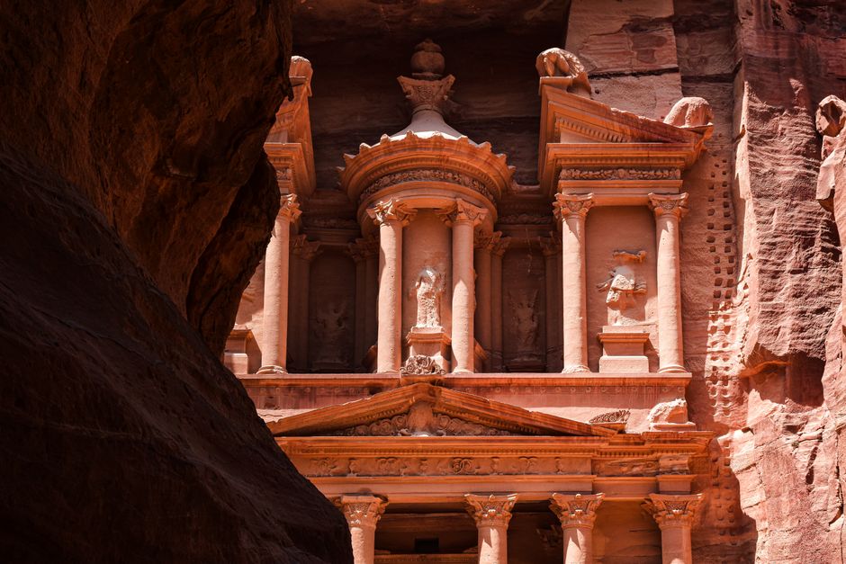 The iconic Treasury (Al-Khazneh) at Petra, Jordan, carved into sandstone cliffs.