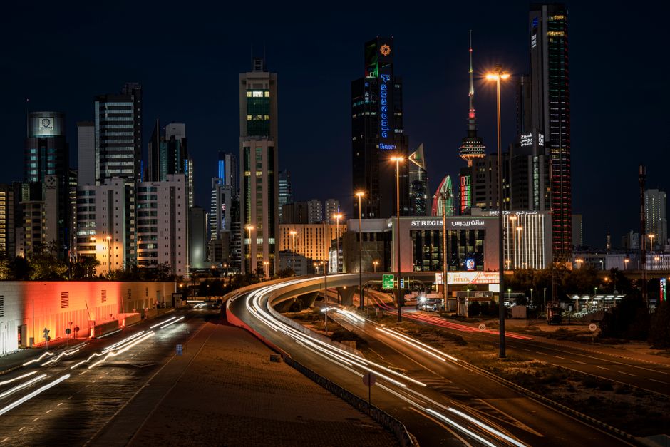 Beautiful Kuwait City skyline at sunset, showing modern architecture and the cost of living in a vibrant city