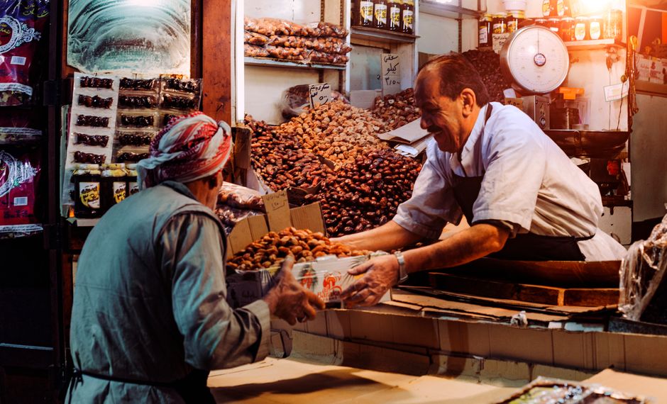 Traveler exploring a traditional souk in Kuwait, ready for adventure